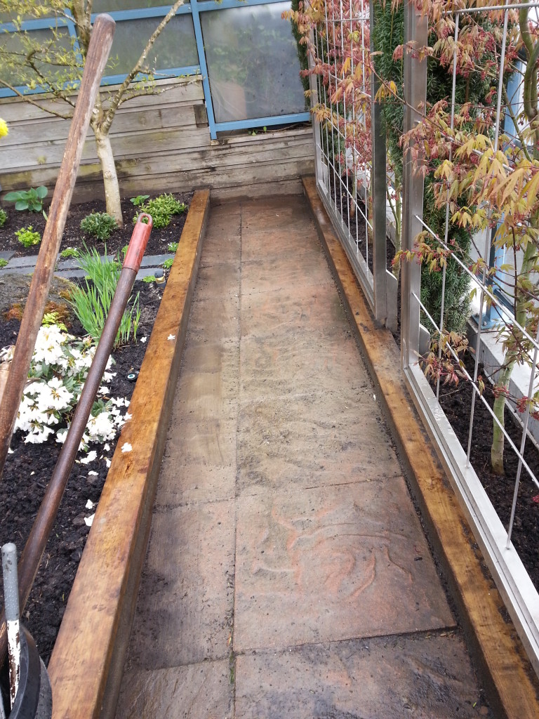 Balcony stone patio pathway and frosted deck glass Vancouver - before soft wash